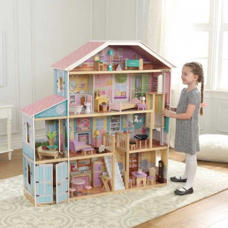 Niña jugando con su kidkraft casa de muñecas gran mansion con vistas 65954