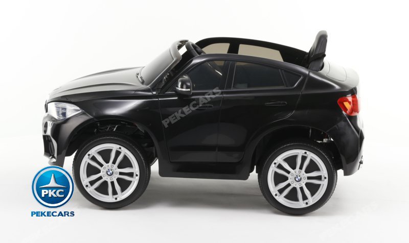 Coche electrico infantil BMW X6M Negro Metalizado vista lateral