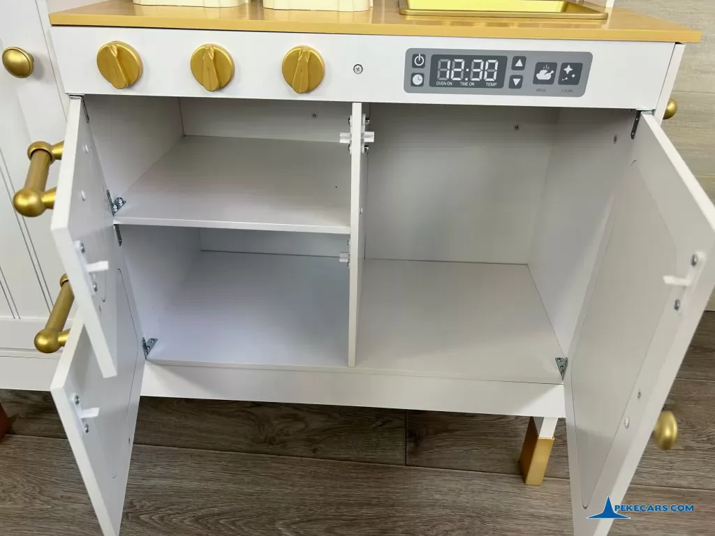 cocina de juguete blanca dorada