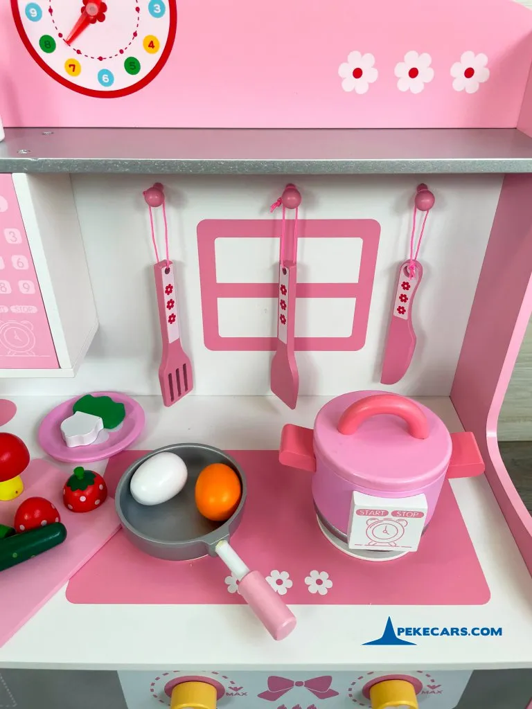 cocina de juguete con comida rosa detalle accesorios