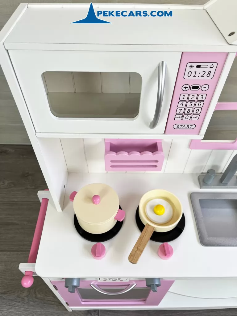 cocina de juguete con comida blanco rosa