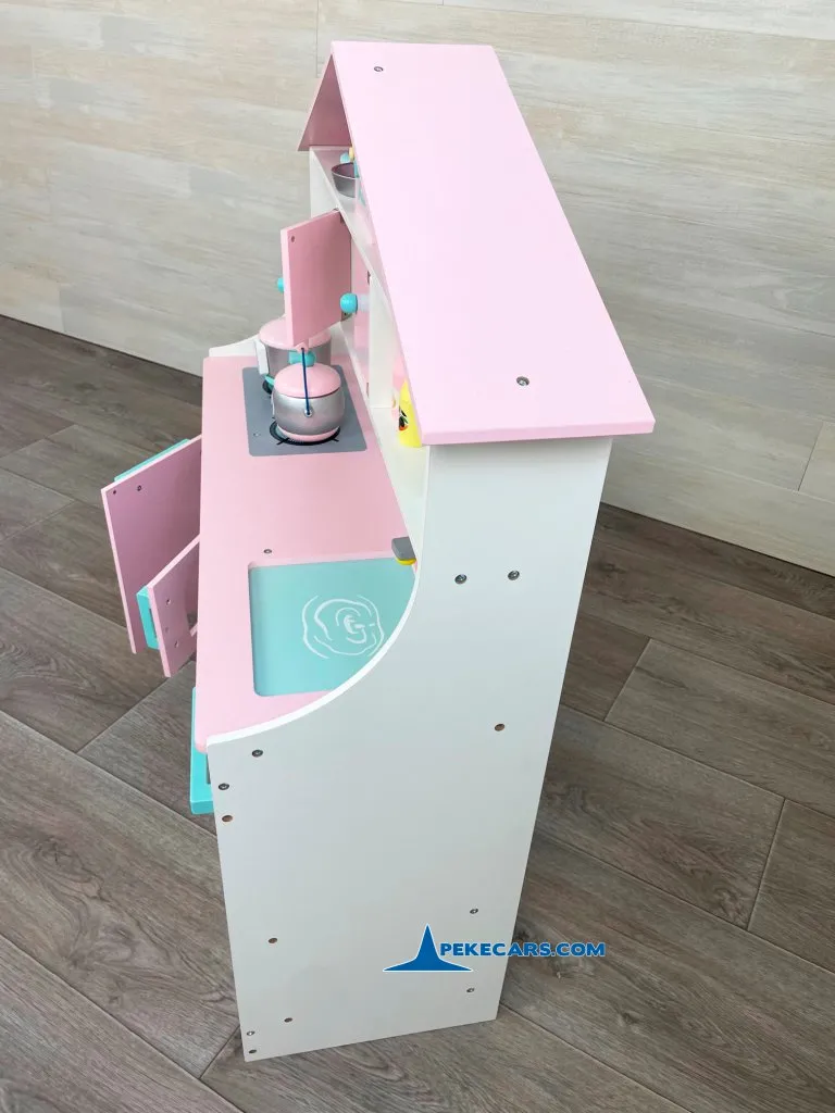 cocina de madera de juguete rosa pastel accesorio detalle izquierda puerta abierta