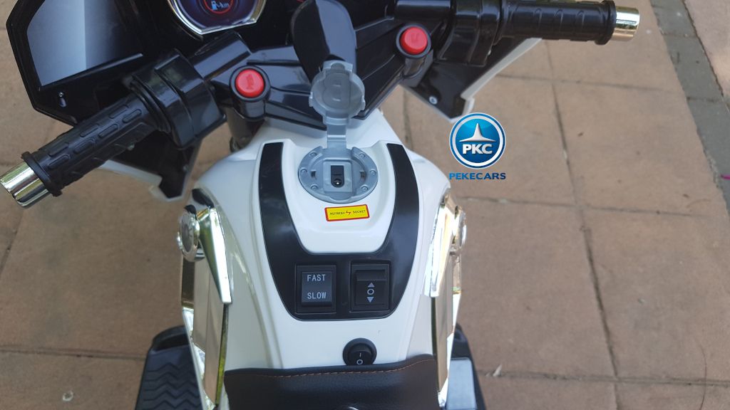 Moto electrica para niños de policia blanca