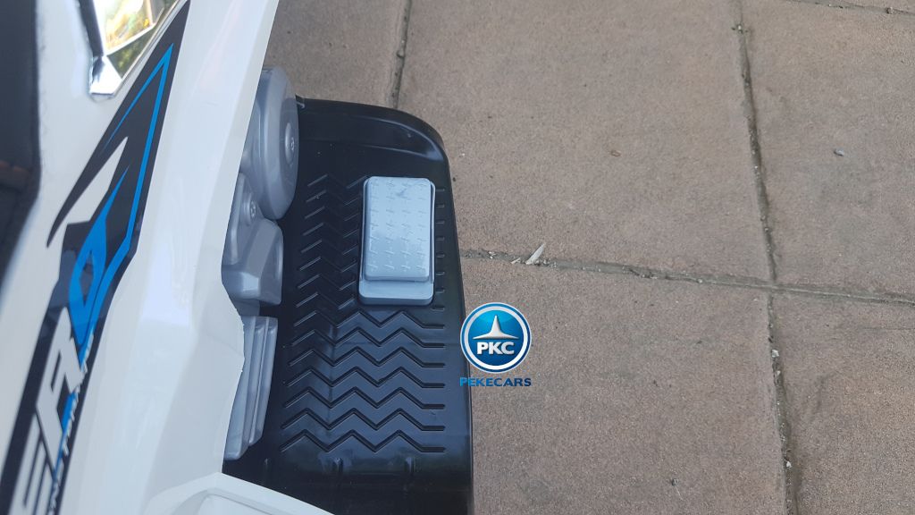 Moto electrica para niños de policia blanca