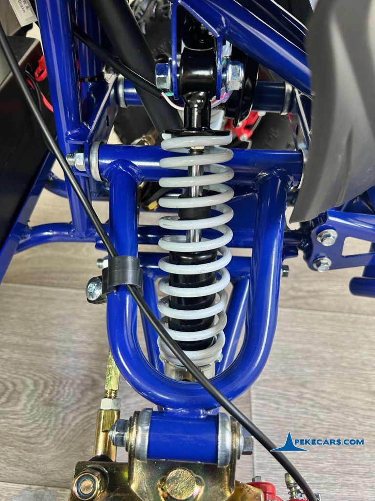 Quad Avenger 48V 1000W Azul para niños amortiguador