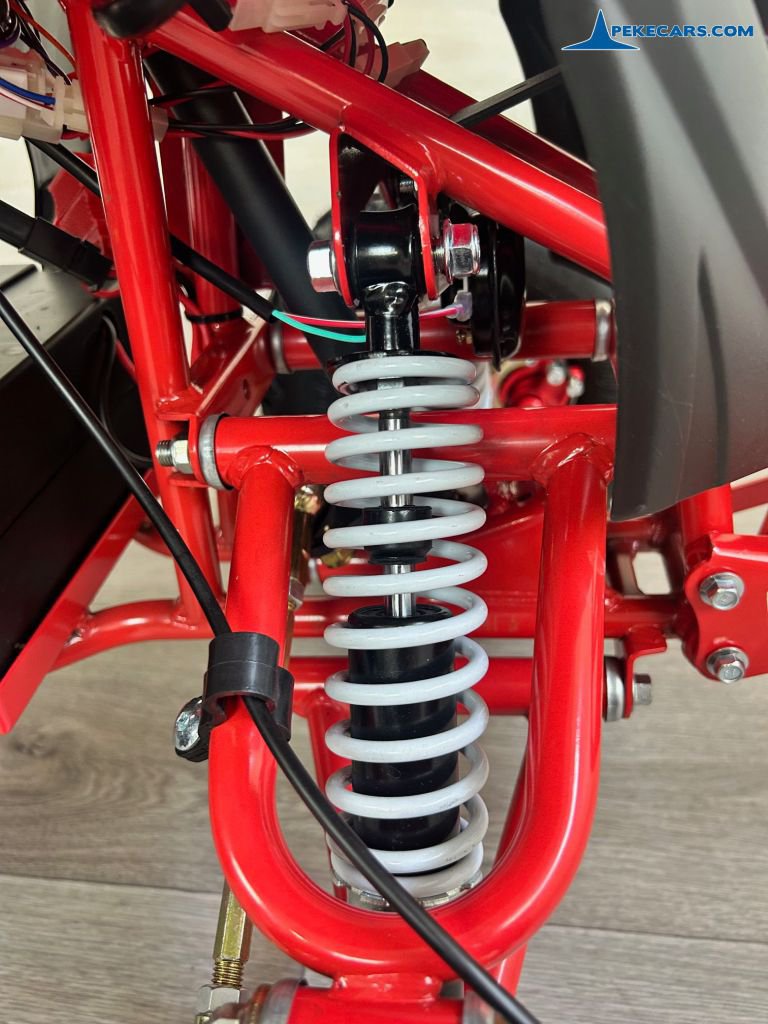 Quad Avenger 48V 1000W Rojo amortiguador