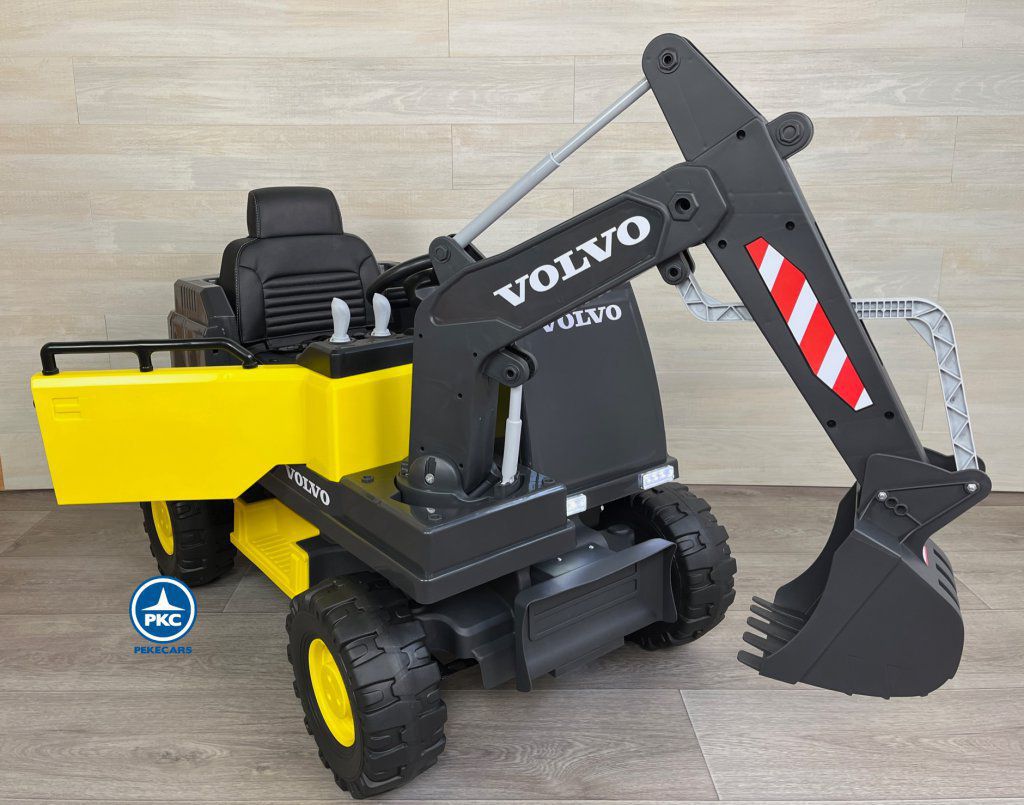 tractor de bateria excavadora volvo amarilla