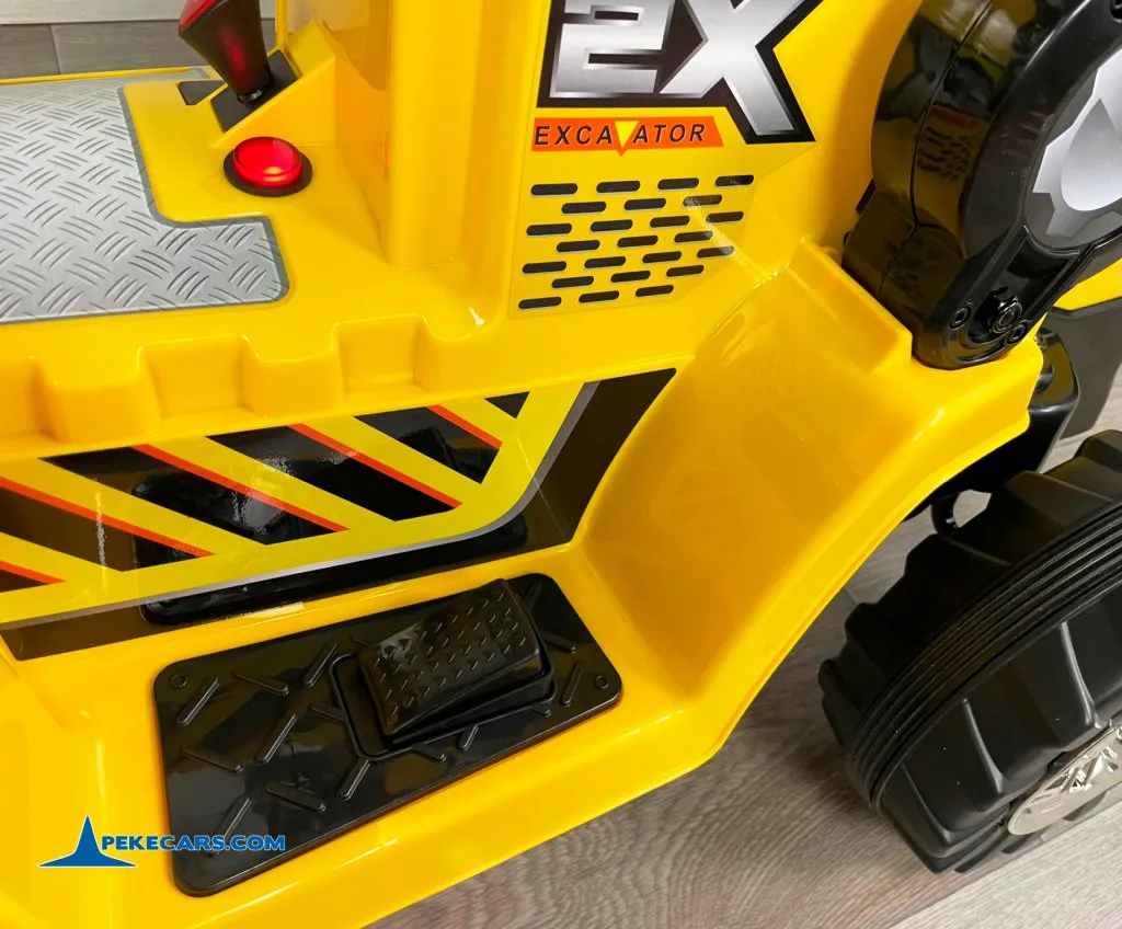 TRACTOR ELÉCTRICO PALA EXCAVADORA DELANTERA 12V 2.4G S/H SPEED CAT STYLE interior