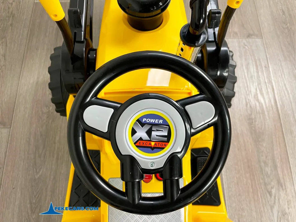 TRACTOR ELÉCTRICO PALA EXCAVADORA DELANTERA 12V 2.4G S/H SPEED CAT STYLE volante