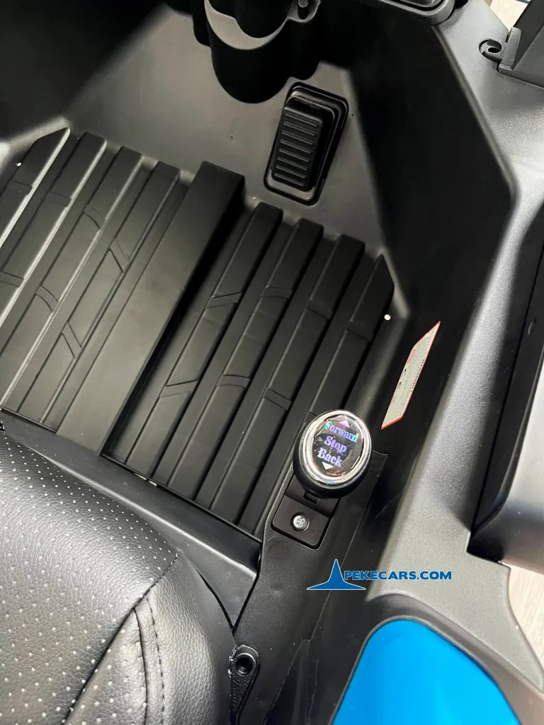 Tractor Electrico Peketrac 5200 con Remolque 2.4G 24V Azul interior